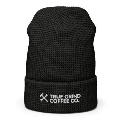 Front view of a waffle beanie featuring the True Grind Coffee Co. logo.