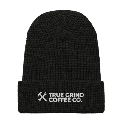 Front view of a waffle beanie featuring the True Grind Coffee Co. logo.